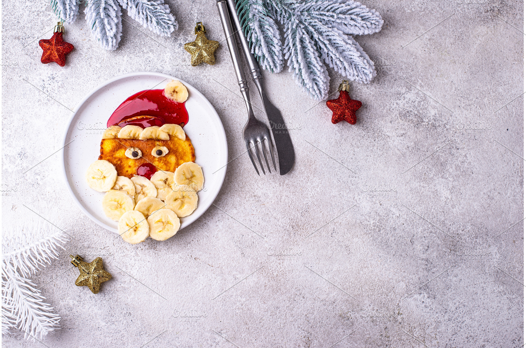 Pancakes in the shape of Santa Claus, a Holiday Photo by Yulia Furman