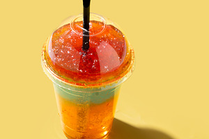 Colorful Frozen Slushie Drink in Plastic Cup, a Food & Drink Photo by etorres69