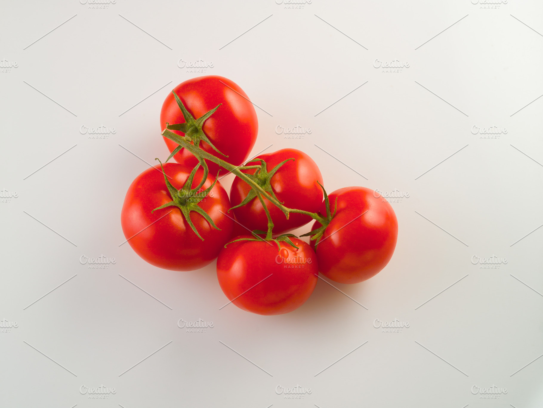 Red tomatoes fresh harvest on a whit stock photo containing vegetable and, a Food & Drink Photo by oleghz