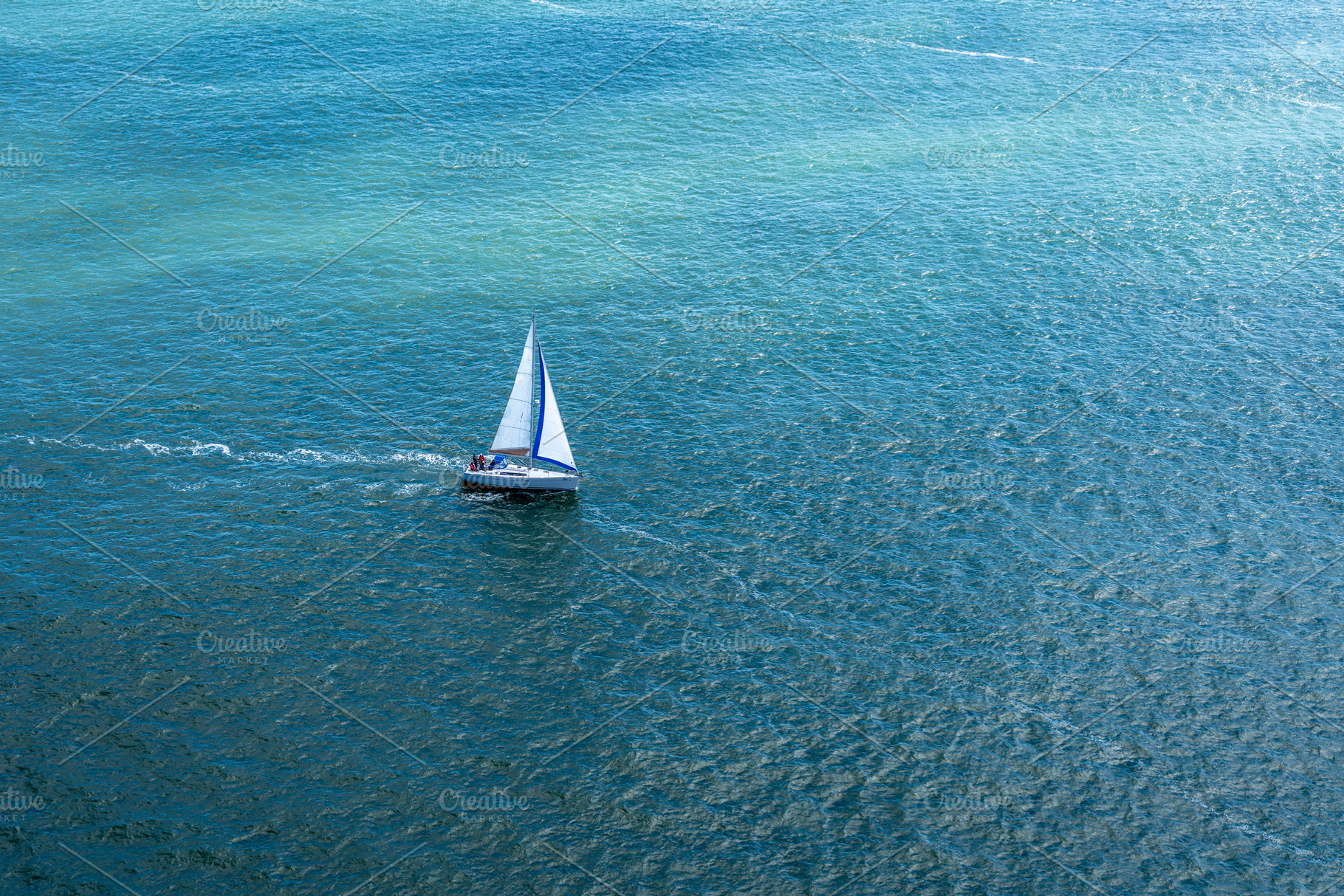 Sailboat gliding through the bay near Golden Gate Bridge, San Fr, a Nature Photo by GoodGoods