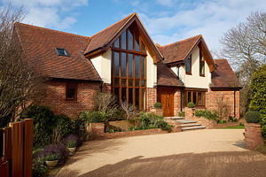 Elegant modern house featuring contemporary brick architecture,, a Photo by Studio ANNA