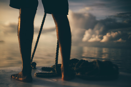 Barefoot on boat at sunset, a Wallpaper Photo by SkyNext