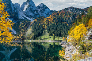 Peaceful autumn Alps mountain lake with reflections. Gosauseen o, a Nature Photo by YuriyB