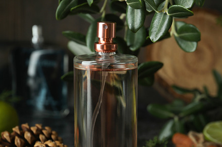 Composition with perfume and ingredients, close up, a Beauty & Fashion Photo by AtlasStudio