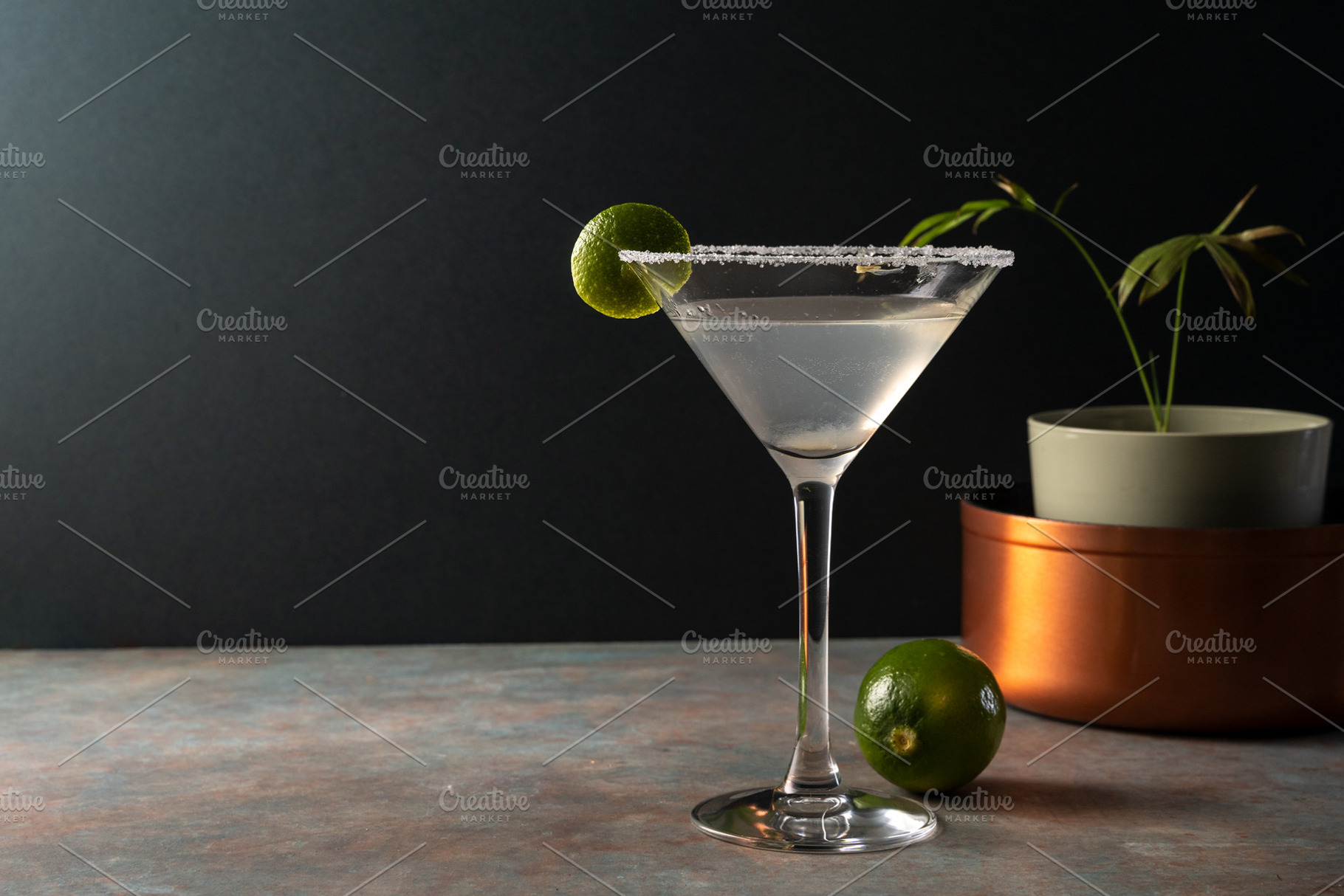 Margarita cocktail with lime in a salted rimmed glass on earthy, a Food & Drink Photo by SZ IMAGE