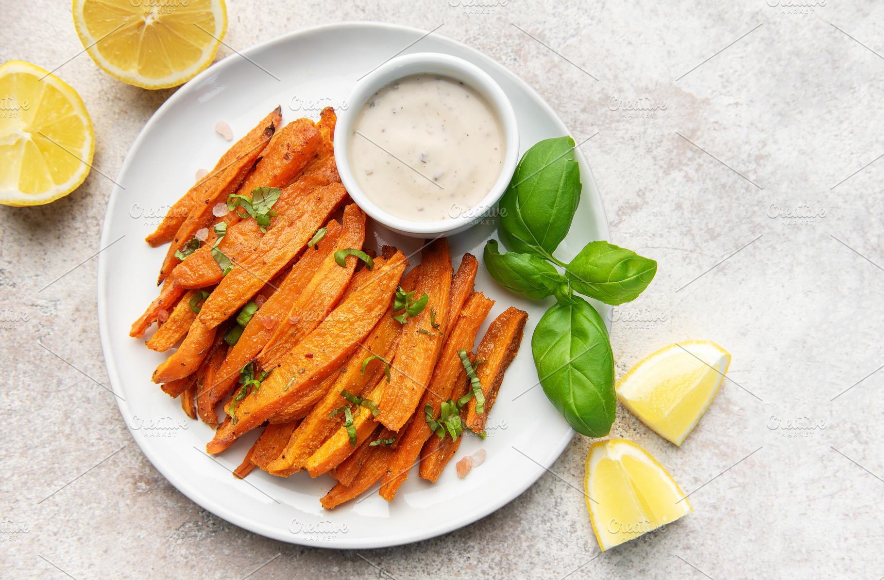 Sweet potato fries with dipping sauce serving as healthy snack, a Food & Drink Photo by Olena Rudo