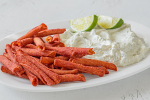 Spicy Takis Fuego Served With Garlic Herb Cream Cheese Dip, a Food & Drink Photo by Alexander Prokopenko
