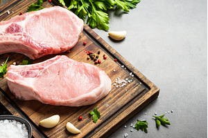 Raw pork meat on cutting board with, a Food & Drink Photo by Nadia-nb