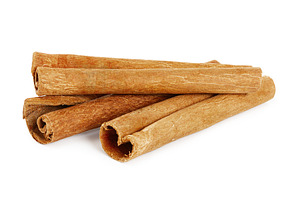 Three cinnamon sticks isolated on wh featuring cinnamon, stick, and isolated