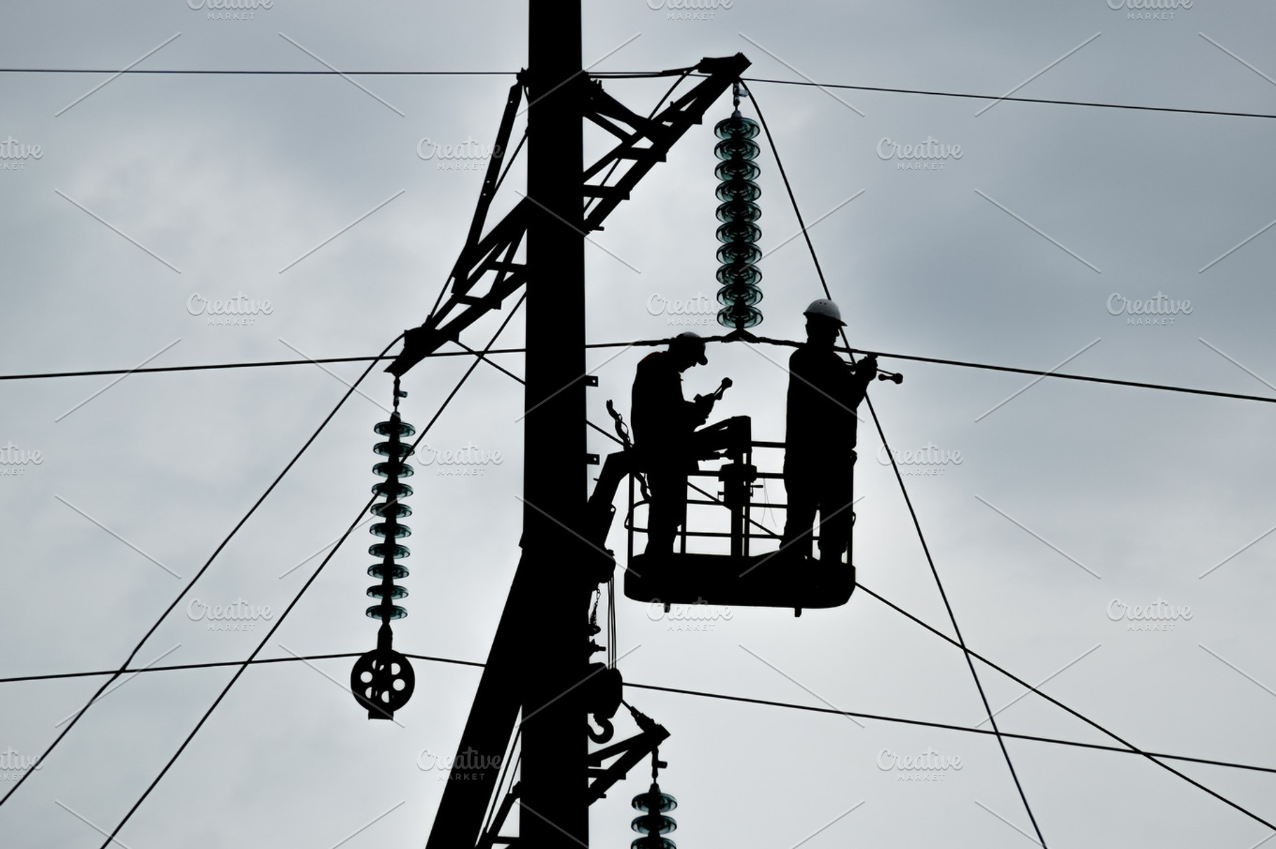 Assembly and installation of new support of a power line stock photo, an Industrial Photo by ELEONIMAGES