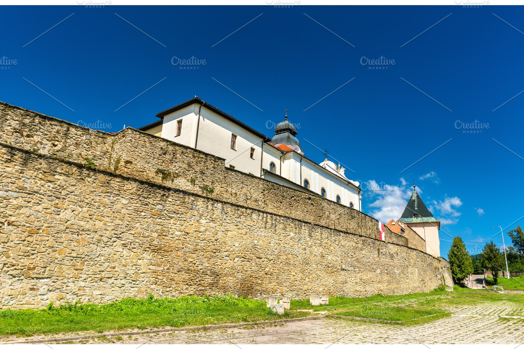 Dfencsive wall surrounding the old town of levoca in slovakia stock photo, an Architecture Photo by Leonid Andronov