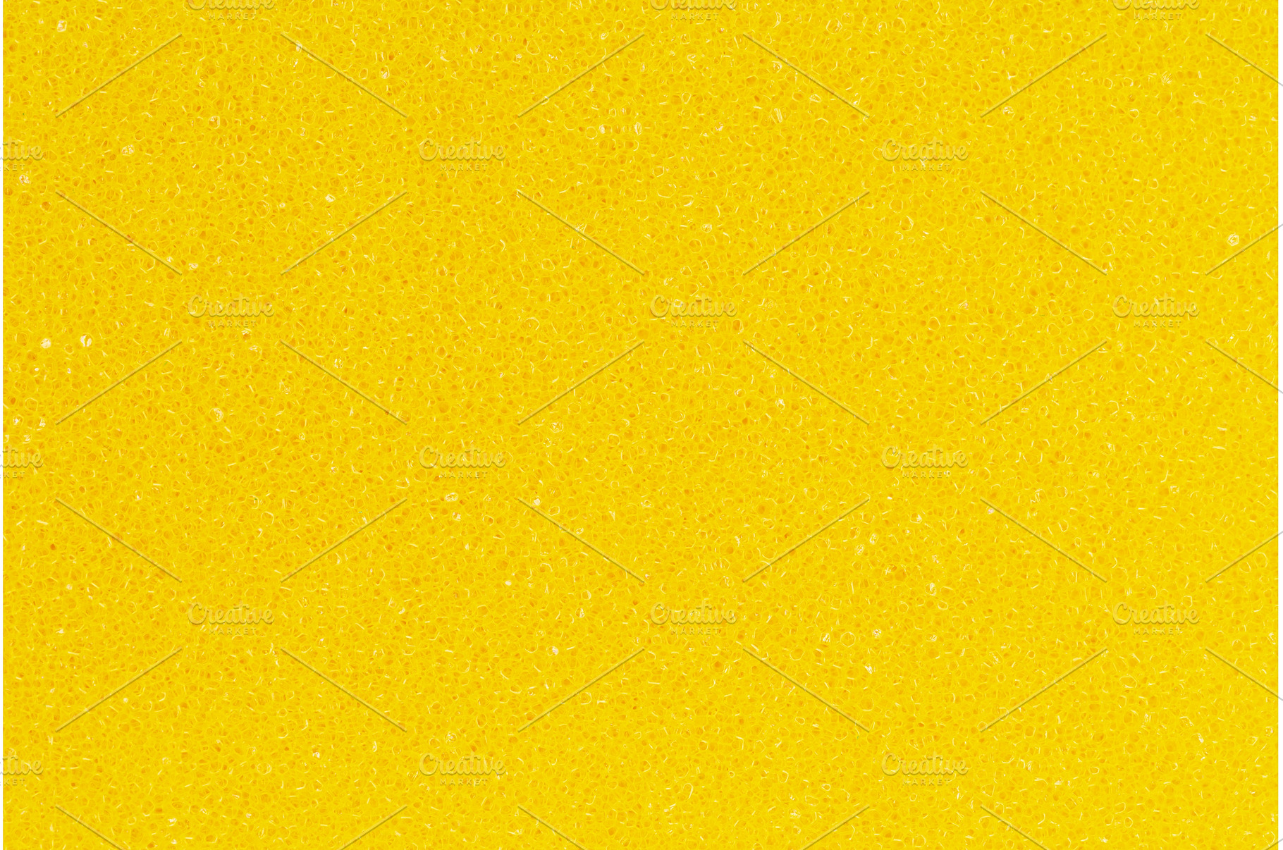 Bright yellow color foam sponge, an Industrial Photo by Alexander-Piragis