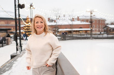 Smiling woman over decorated city, a Holiday Photo by morrowlight