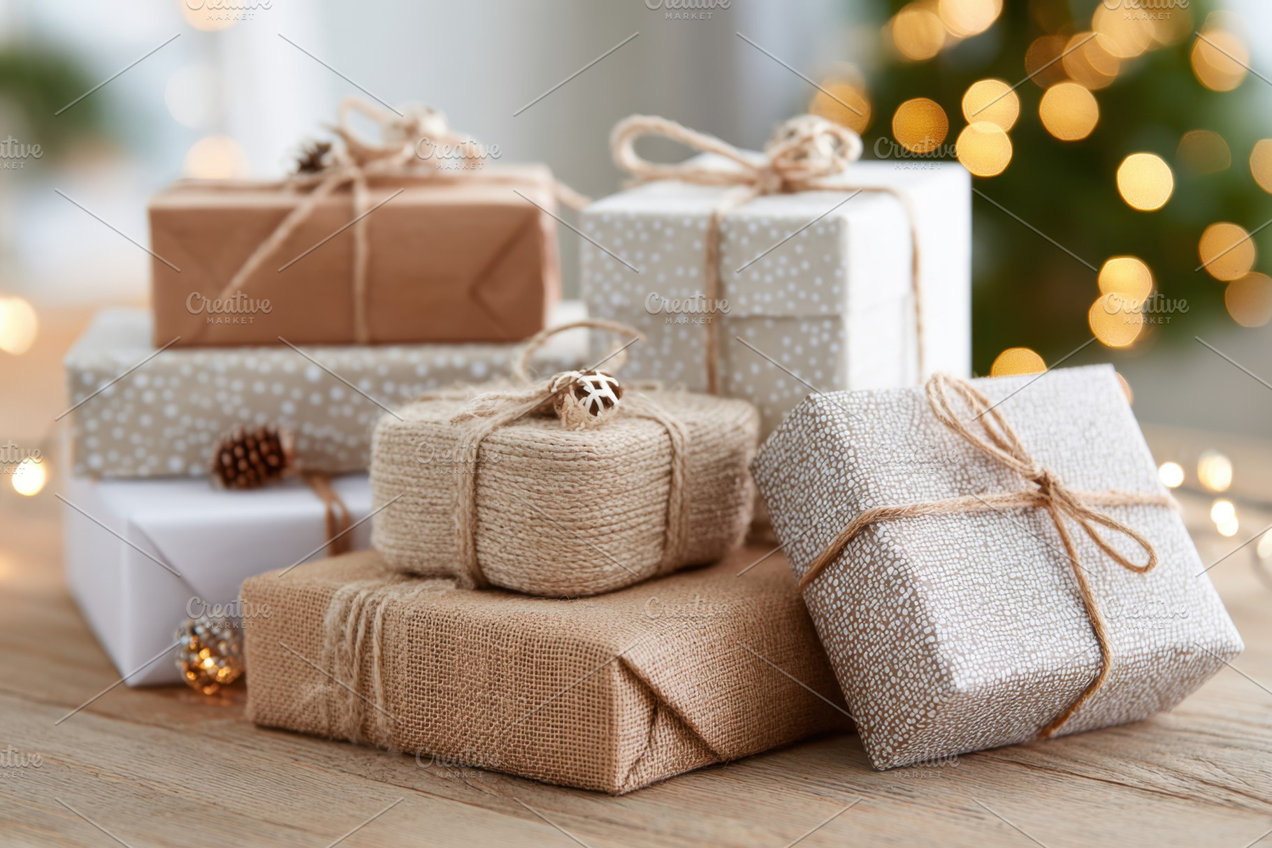 Beautifully wrapped gifts on a wooden surface, a Holiday Photo by AlyaAnd