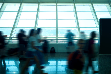 Passengers in airport terminal, an Architecture Photo by GoodGoods