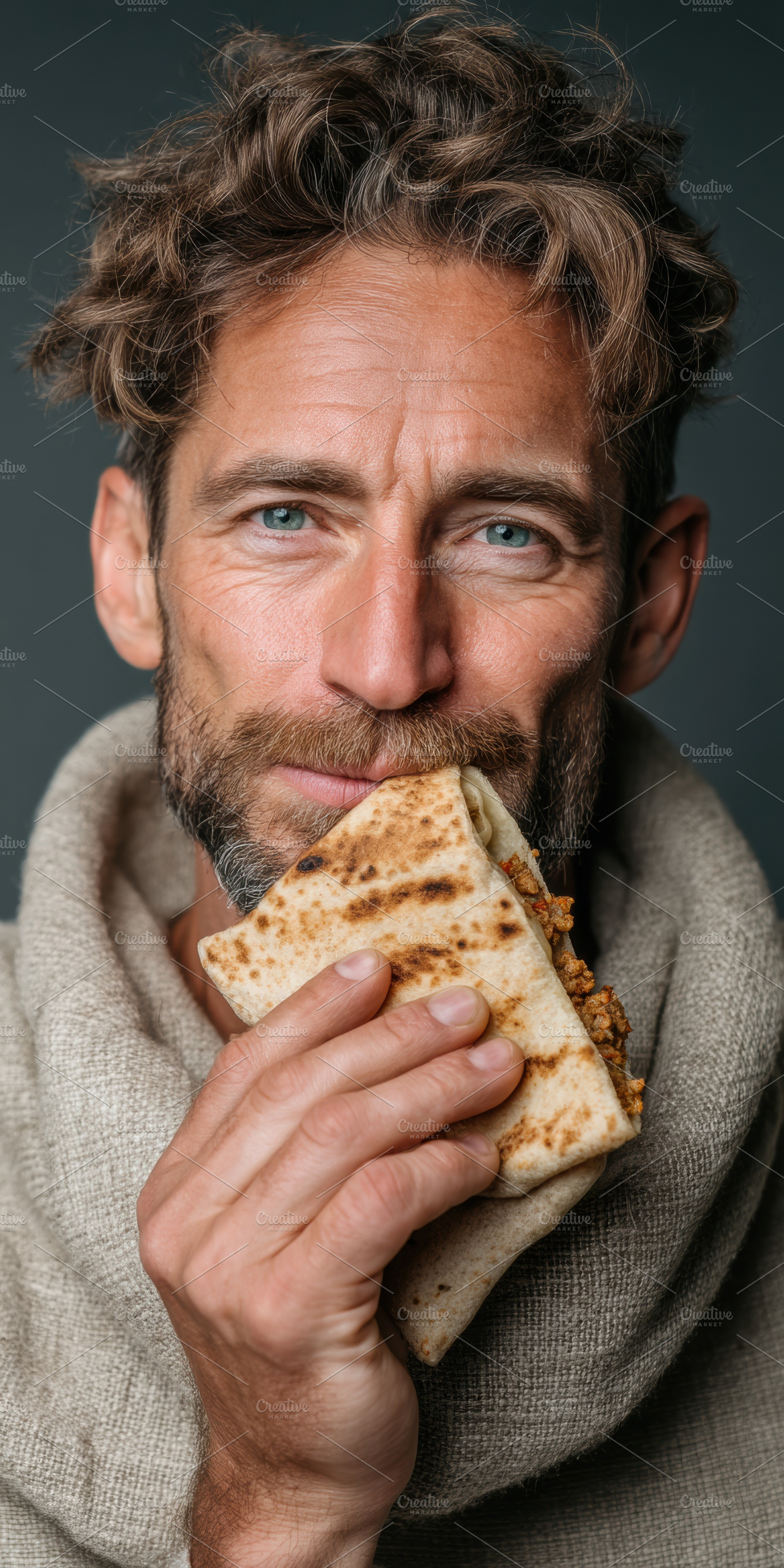 Man Enjoying a Fresh Piadina, a Food & Drink Photo by Virgo Studio