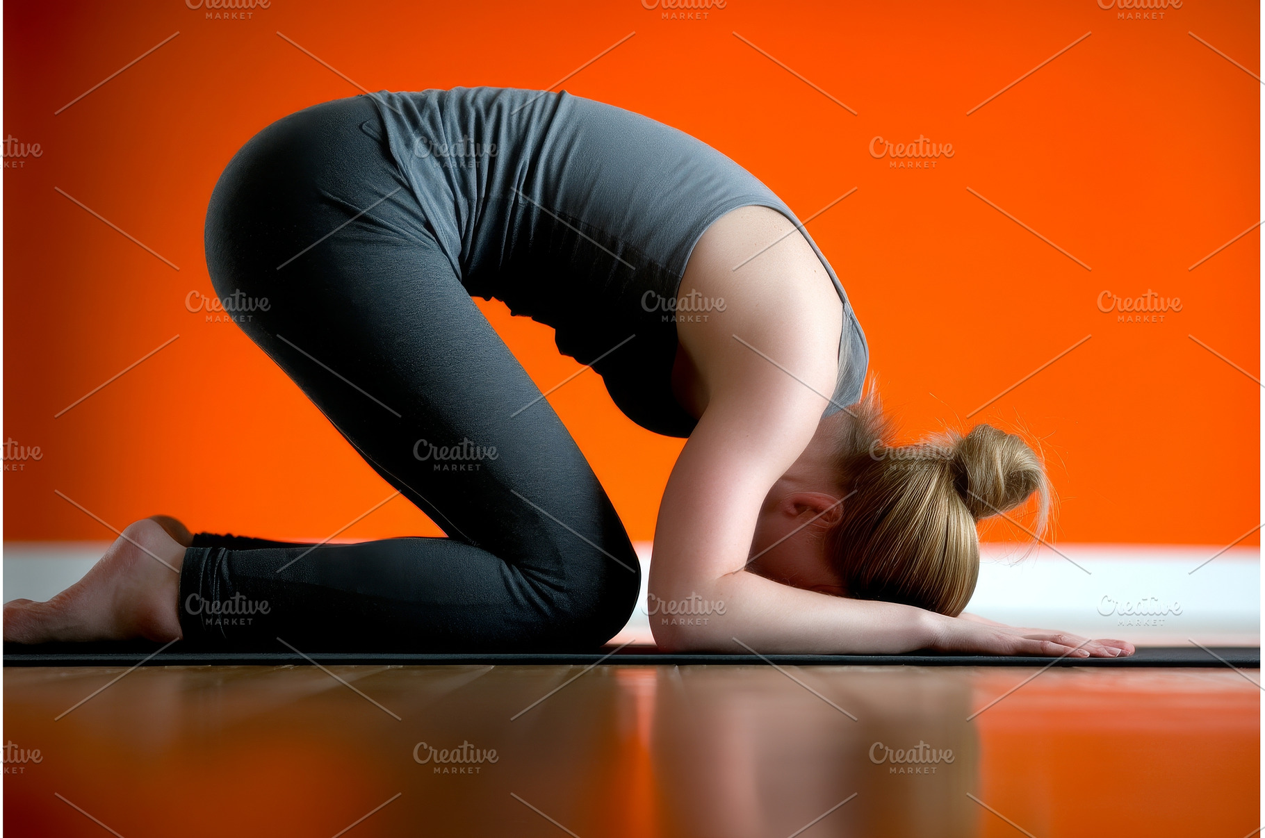 A woman in a studio is using a rug, a Sports & Recreation Photo by ZinetroN