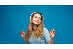 Cheerful young woman wearing blue t, a Person Photo by volodymyrshtun13795