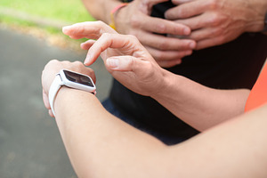 Runner Checking Smartwatch During Outdoor Workout, a Sports & Recreation Photo by etorres69