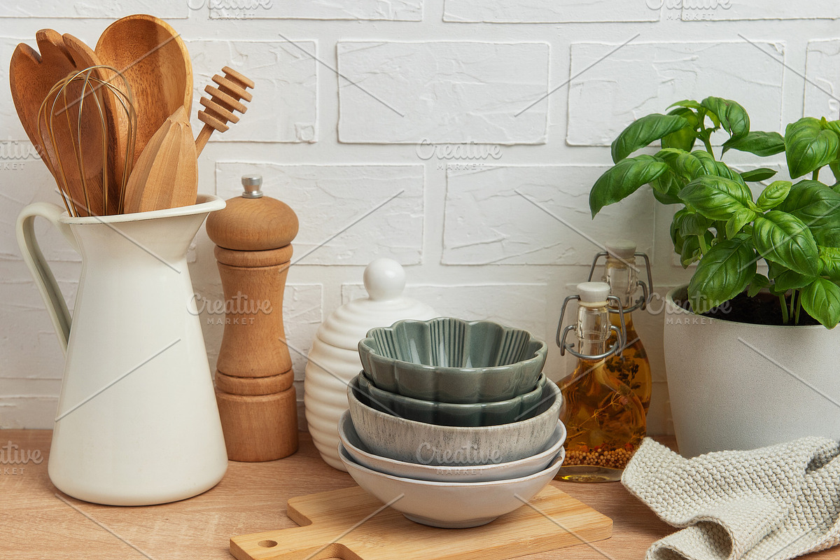 Kitchen utensils, bowls and spices resting on wooden countertop, a Food & Drink Photo by Olena Rudo (Photo 1 of 2)