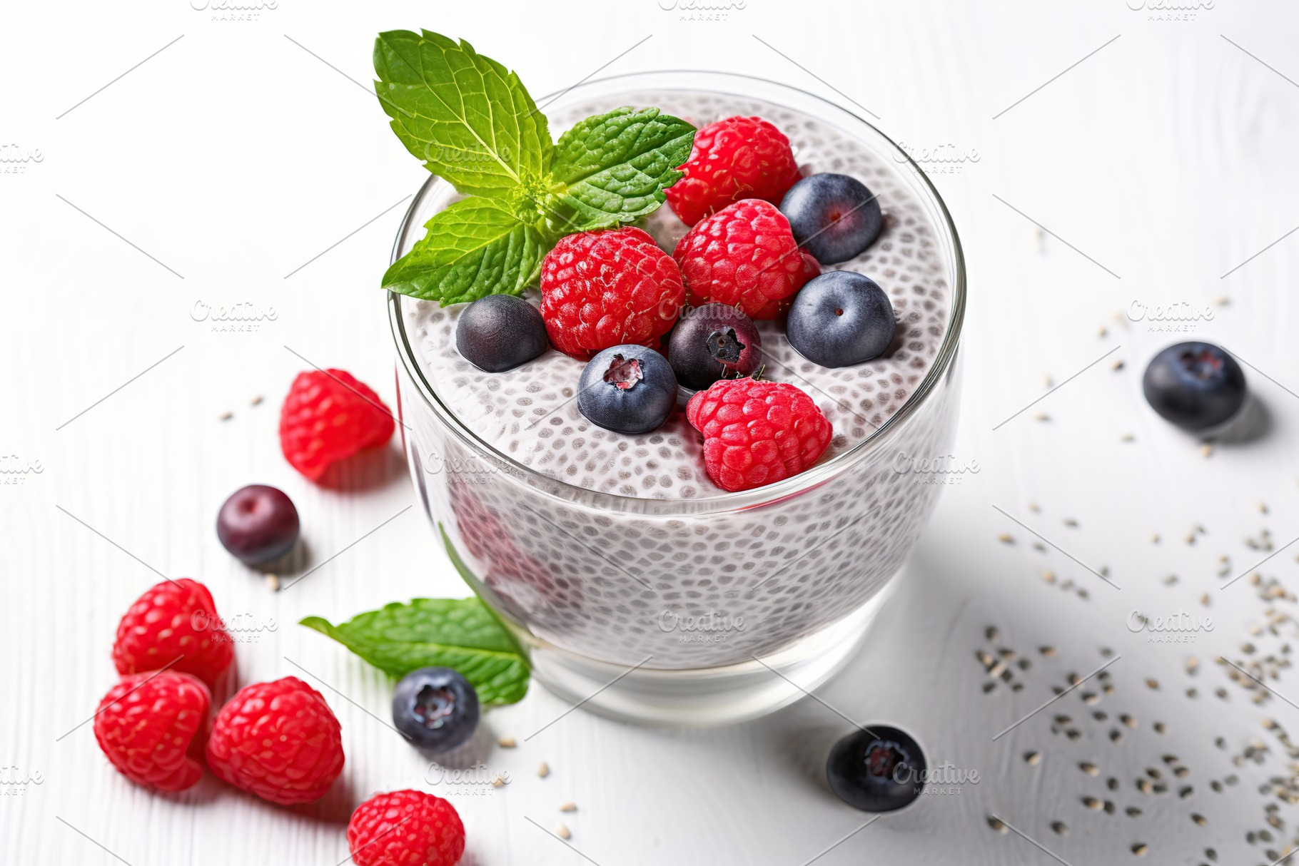Chia pudding with berries and granola in glass, a Food & Drink Photo by AlyaAnd
