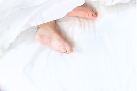 Baby sleeps on a white bed with his, a Person Photo by yanadjana