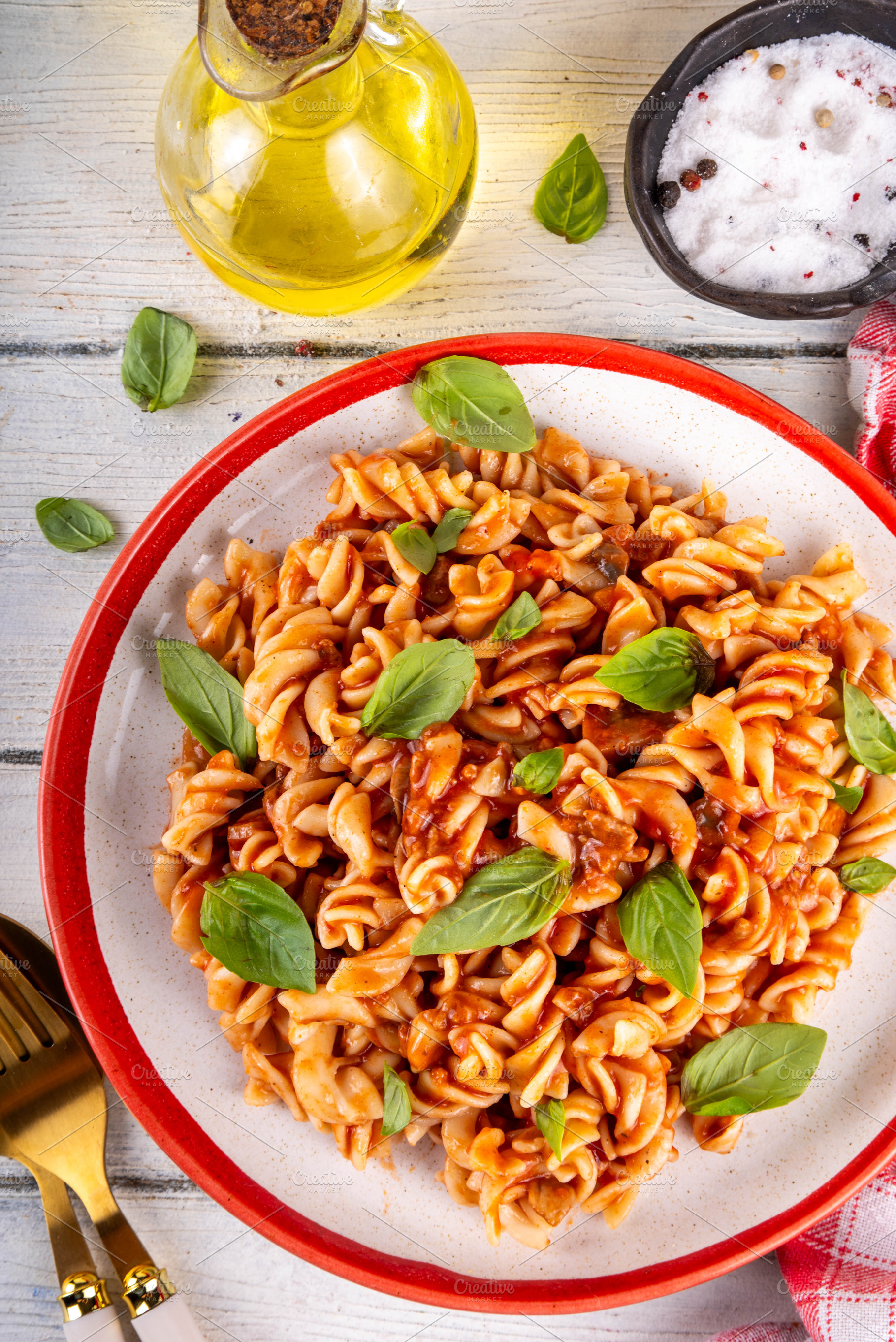 Fusilli pasta with bolognese sauce, with ground beef, mushrooms,, a Food & Drink Photo by Rimma