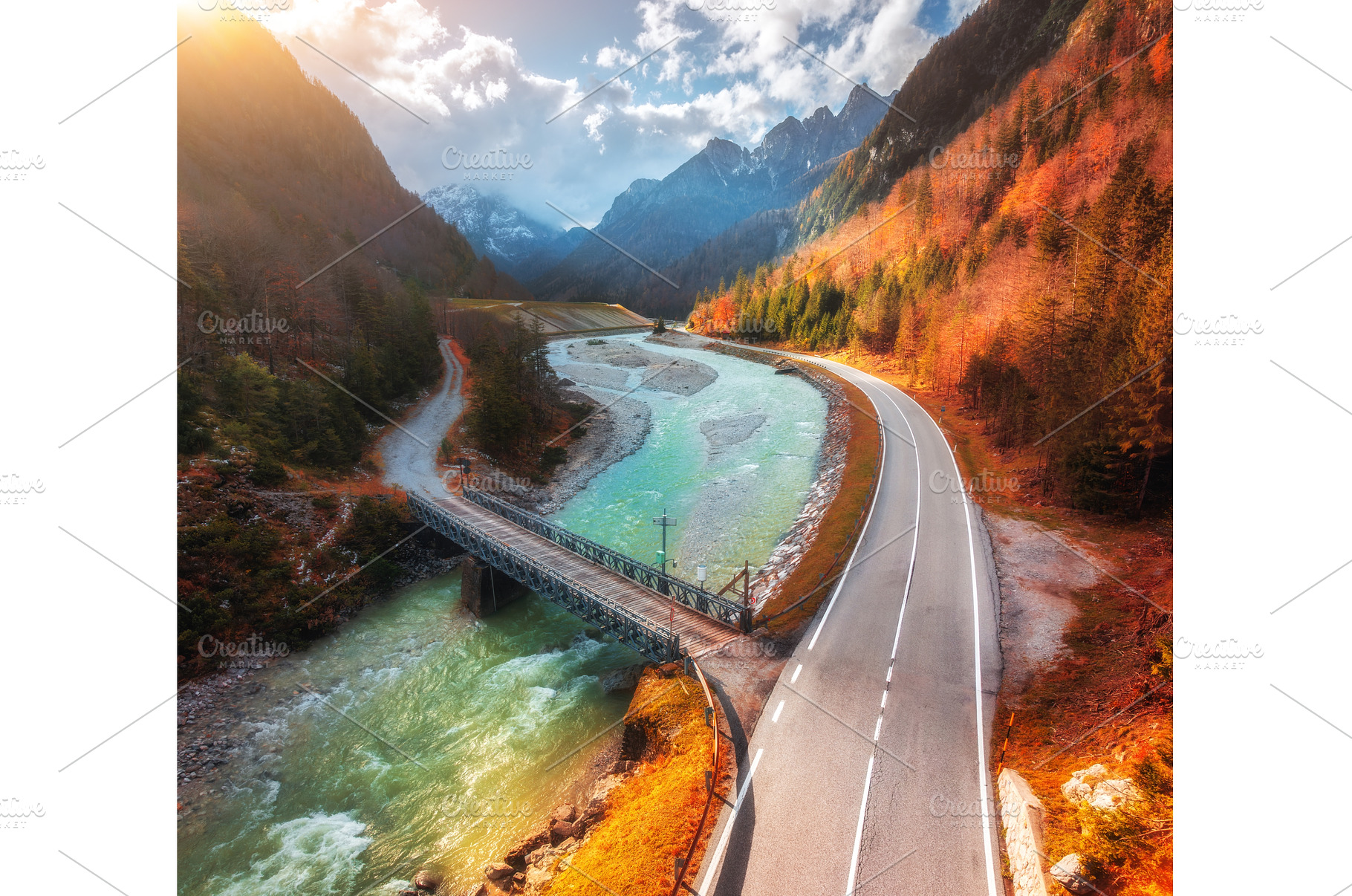 Aerial view of winding mountain road, a Nature Photo by den-belitsky