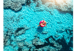 Aerial view of woman relaxing on, a Nature Photo by den-belitsky