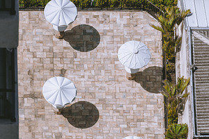 Terrace with white umbrellas, an Industrial Photo by SkyNext