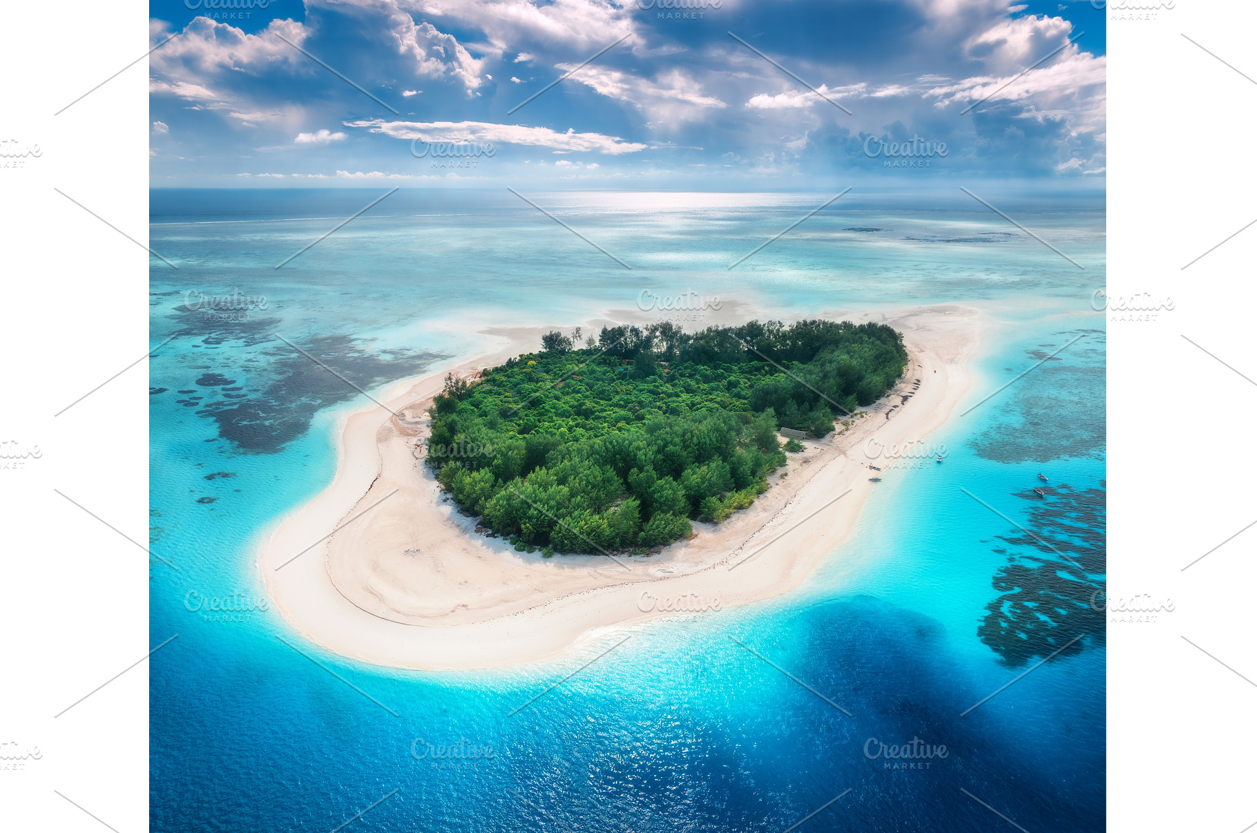 Aerial view of blue sea and Mnemba, a Nature Photo by den-belitsky