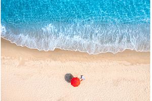 Aerial view of red umbrella on white, a Nature Photo by den-belitsky