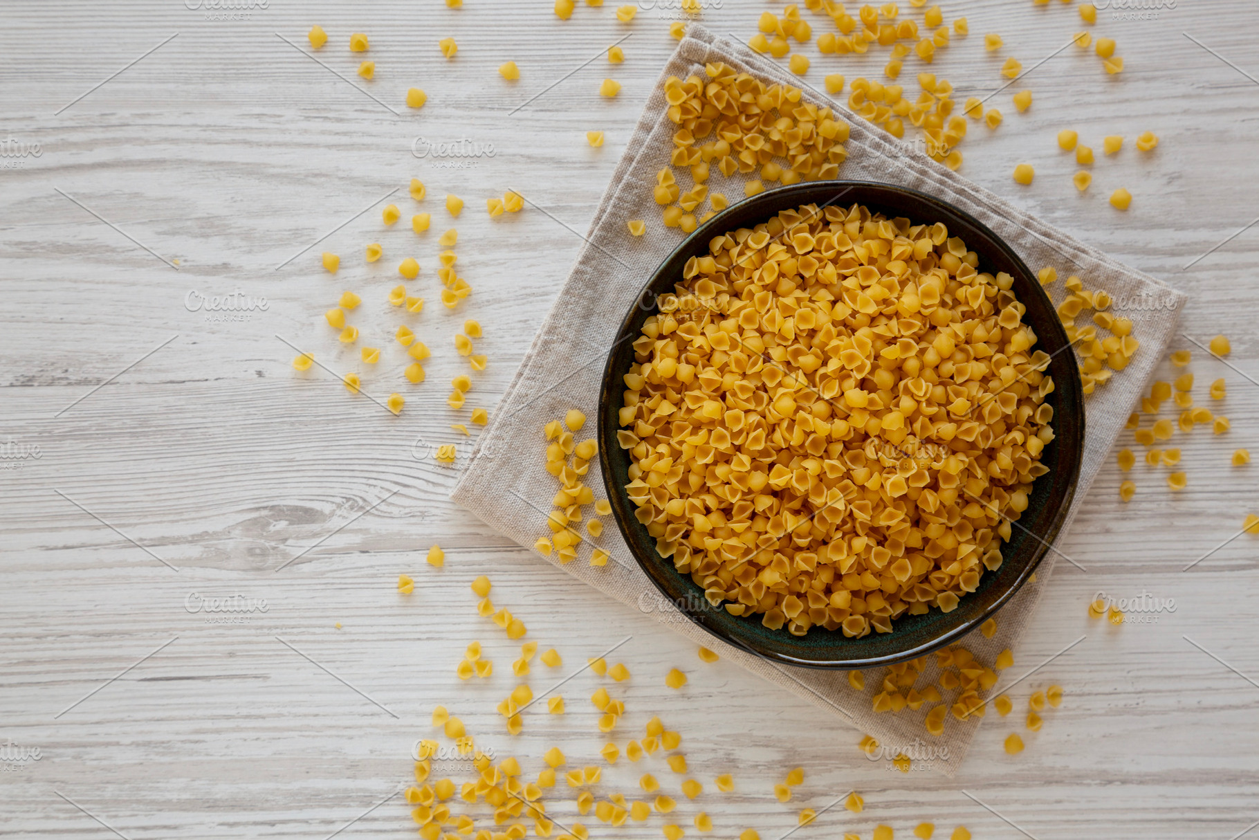 Homemade Perlini Pasta in a Bowl, top view. Copy space., a Food & Drink Photo by LiudmylaChuhunova