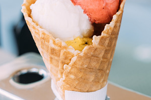 Ice cream cone sweet treat crispy waffle gelato, a Food & Drink Photo by Photo Drive Studio
