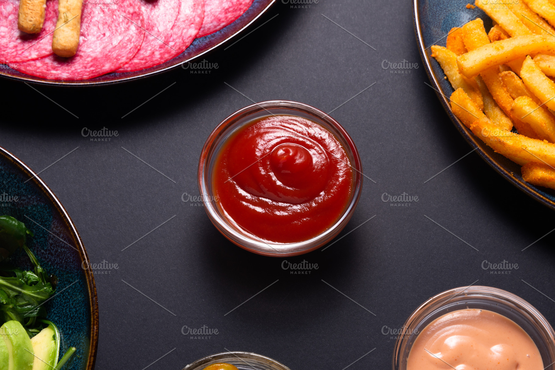 Tomato sauce in a small glass bowl on a black background. Classi, a Food & Drink Photo by MDBildes