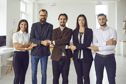 Young office workers or startuppers, a Person Photo by StudioRomantic