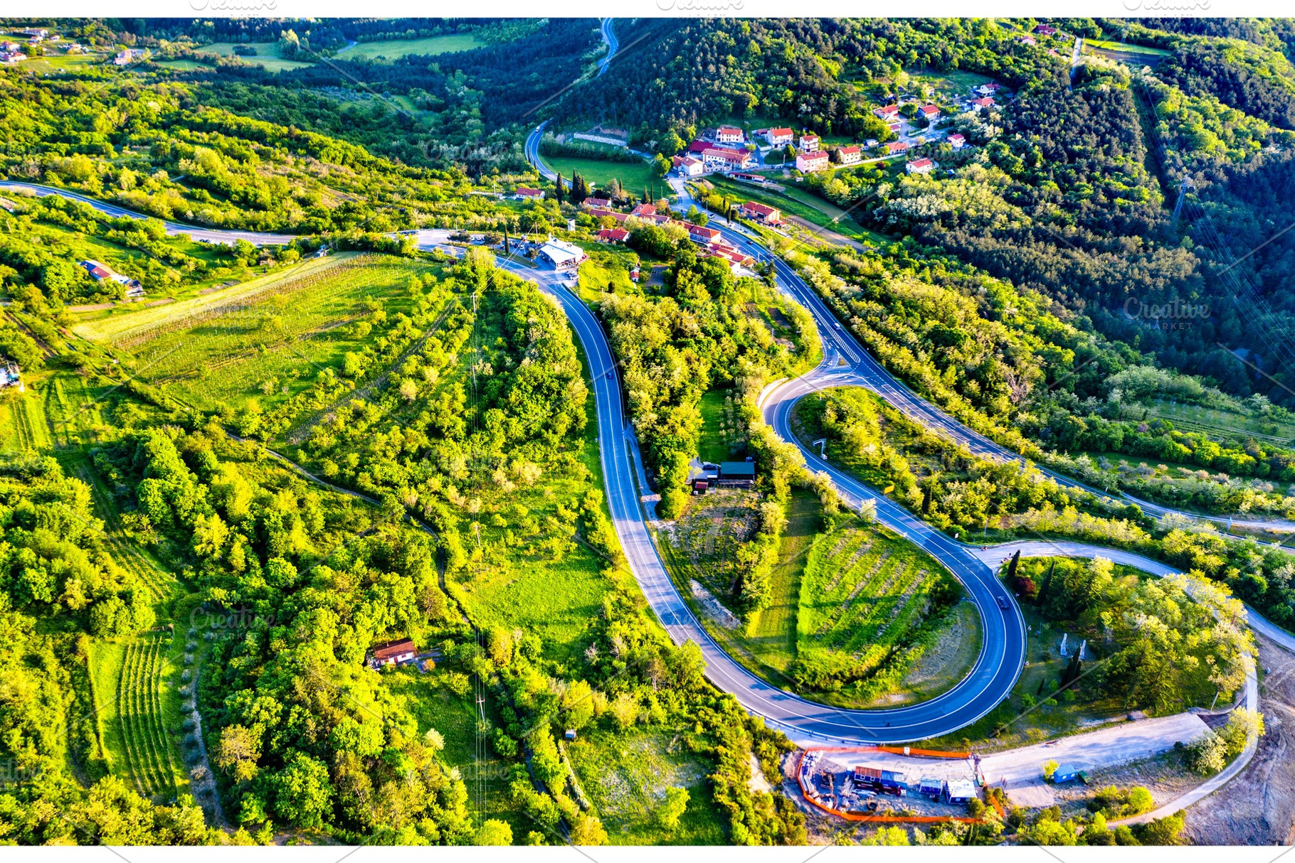 Aerial view of a winding road in, a Nature Photo by Leonid Andronov