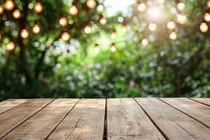 Empty brown wooden table with different party decorations, outdo, a Background Photo by AlyaAnd