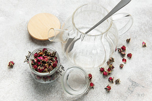 Glass teapot with dried rose buds for herbal tea, a Food & Drink Photo by Olena Rudo
