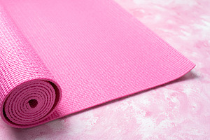 Yoga mat on pink background stock photo containing yoga and mat