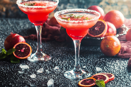 Blood orange margarita containing cocktail, orange, and alcohol, a Food & Drink Photo by piter.goskov
