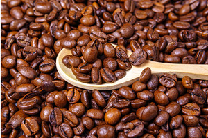 Coffee Beans Close-up Pours A Wooden