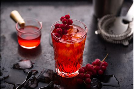 Alcoholic cocktail with red currant, a Food & Drink Photo by Yulia Furman