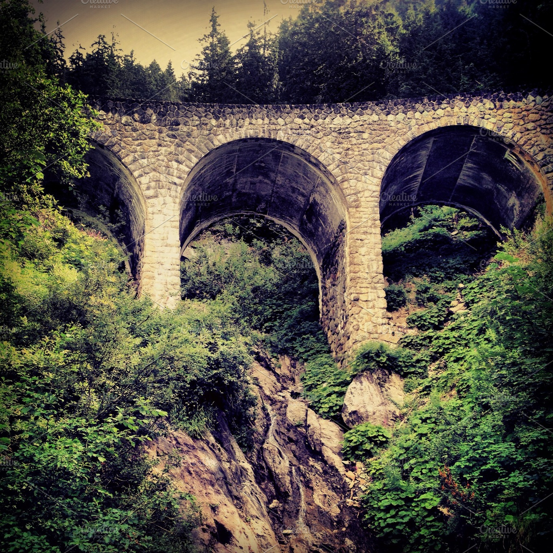 Stone bridge featuring medieval, bridge, and river