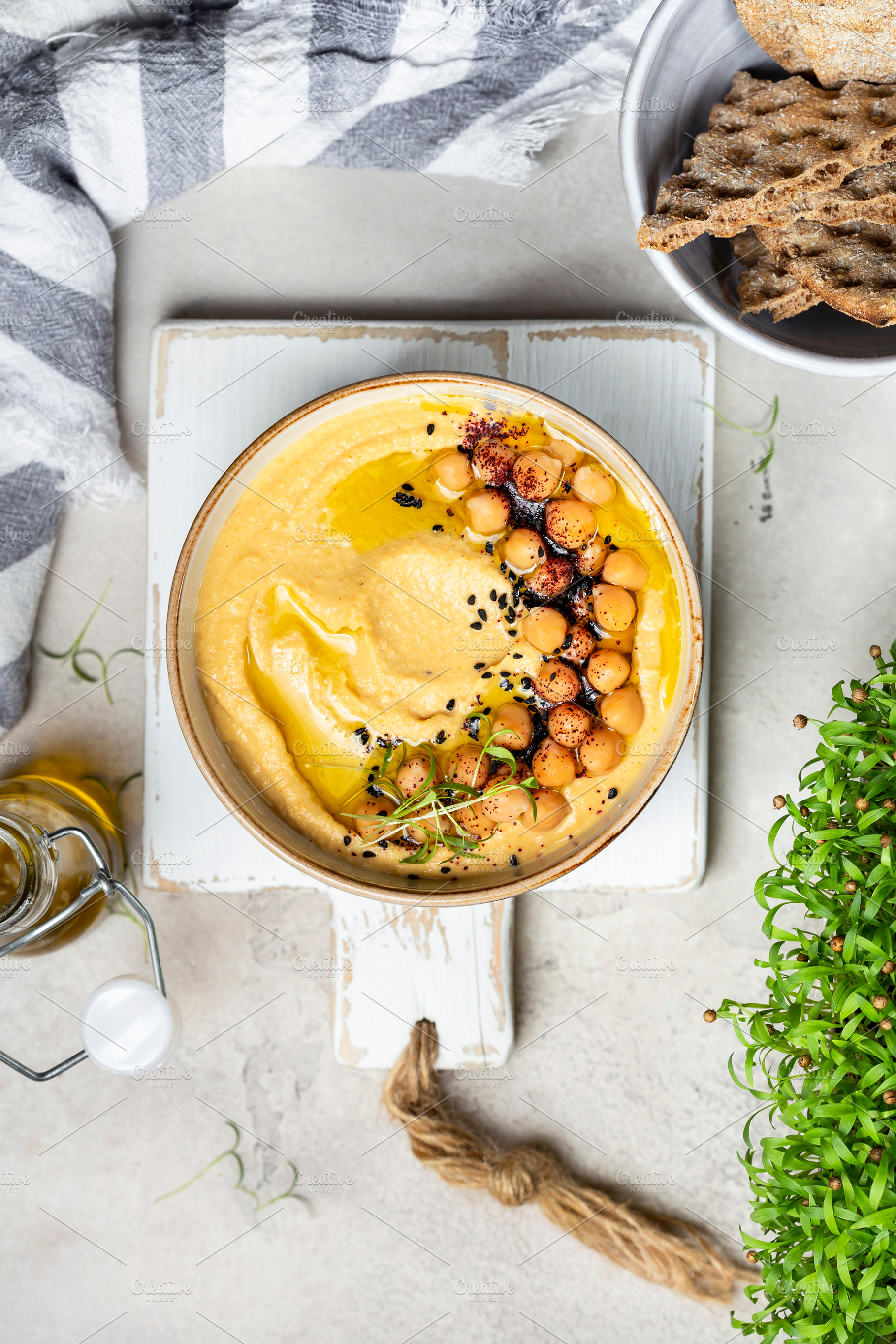 Traditional homemade chickpea hummus, a Food & Drink Photo by Marina_Pronina