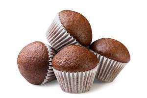 Pile of chocolate muffins close-up, a Food & Drink Photo by innakreativ