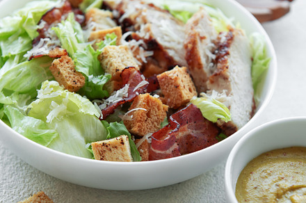 A bowl  of  Caesar salad, a Photo by Olena Rudo