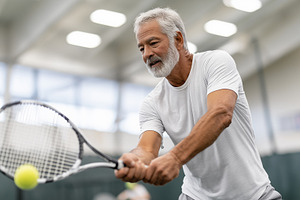 Focused senior man playing tennis., a Sports & Recreation Photo by MistyDay