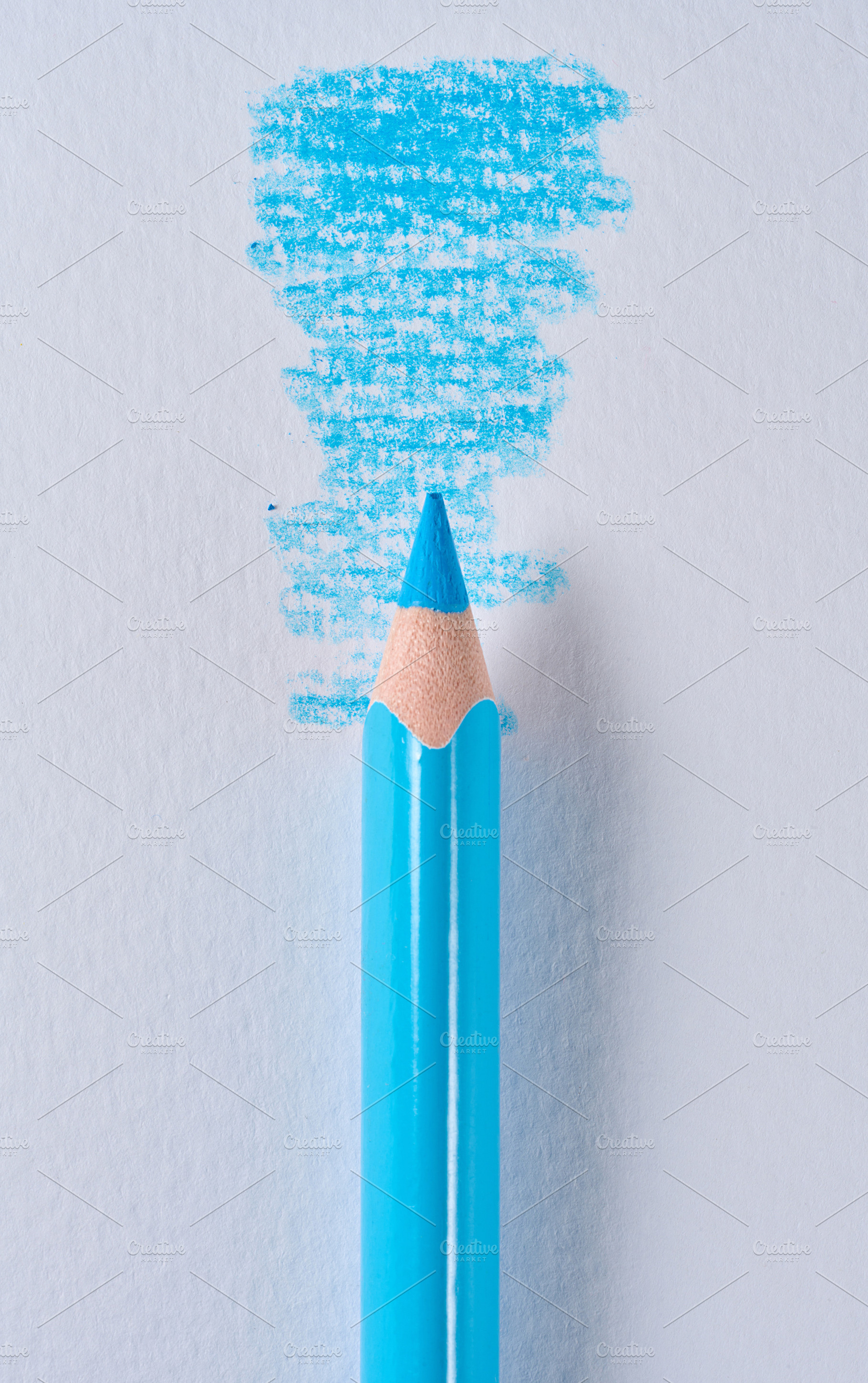 Blue lead pencil and shading on white paper, a Background Photo by ndanko