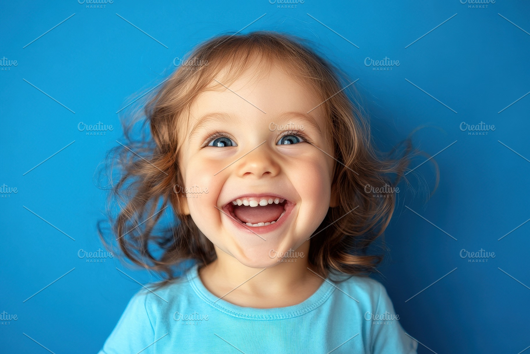 Little girl on a blue background, a Photo by Pavel_design